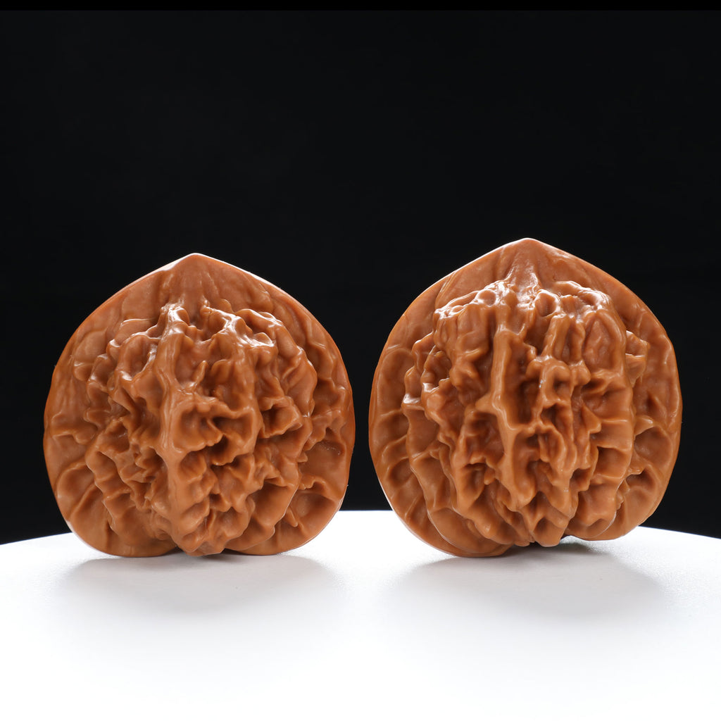 “Qilin Scale Pattern” Imperial Collection Qilin Guanmao Walnuts Pair | Size:48L*50W*47H | UPI:UR-00054