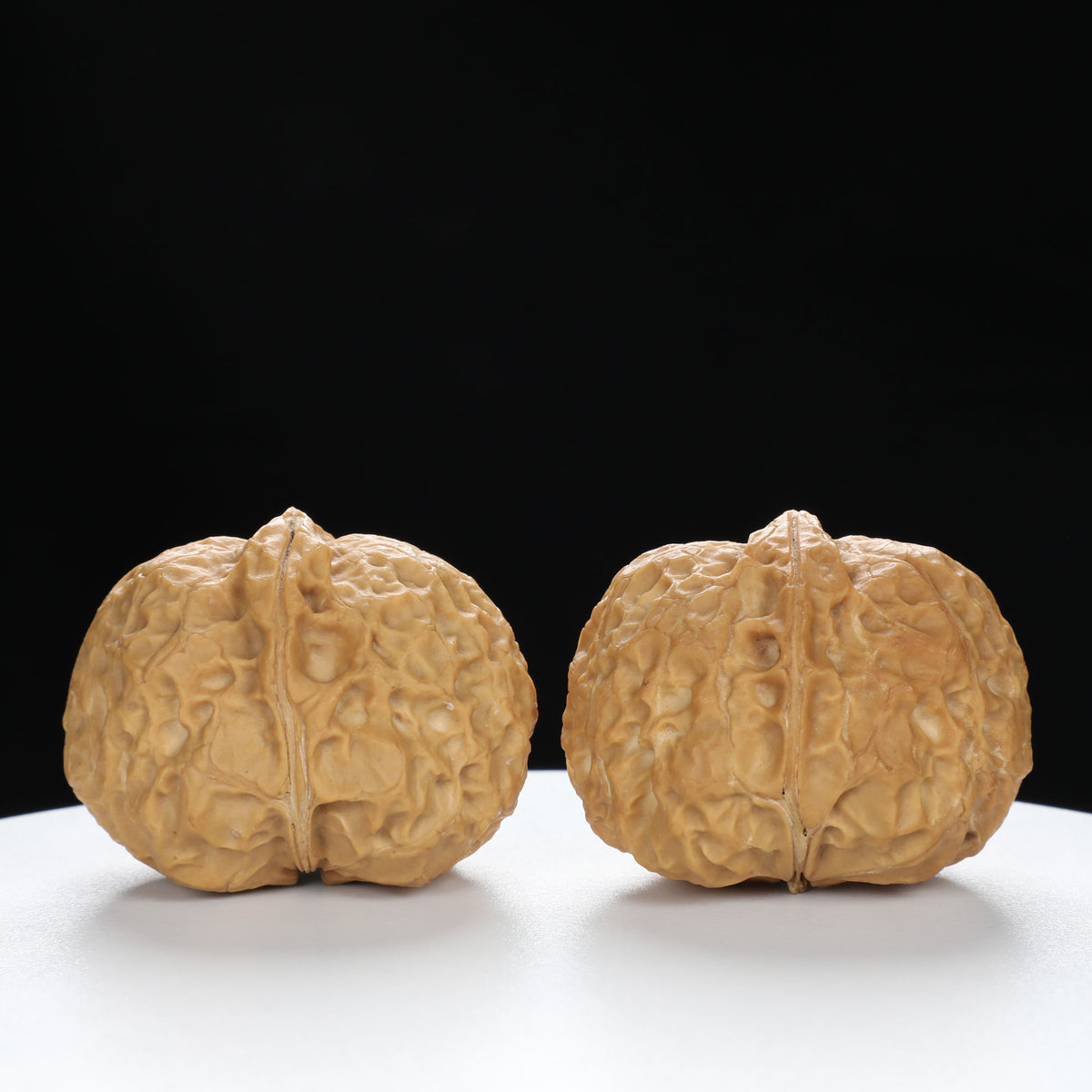 “Fortune Ingot” Big Yuanbao Gold Ingot Shape Yunnan Cloud Iron Wenwan Walnuts Pair | Size:33L*44W*35H | UPI:UR-00109