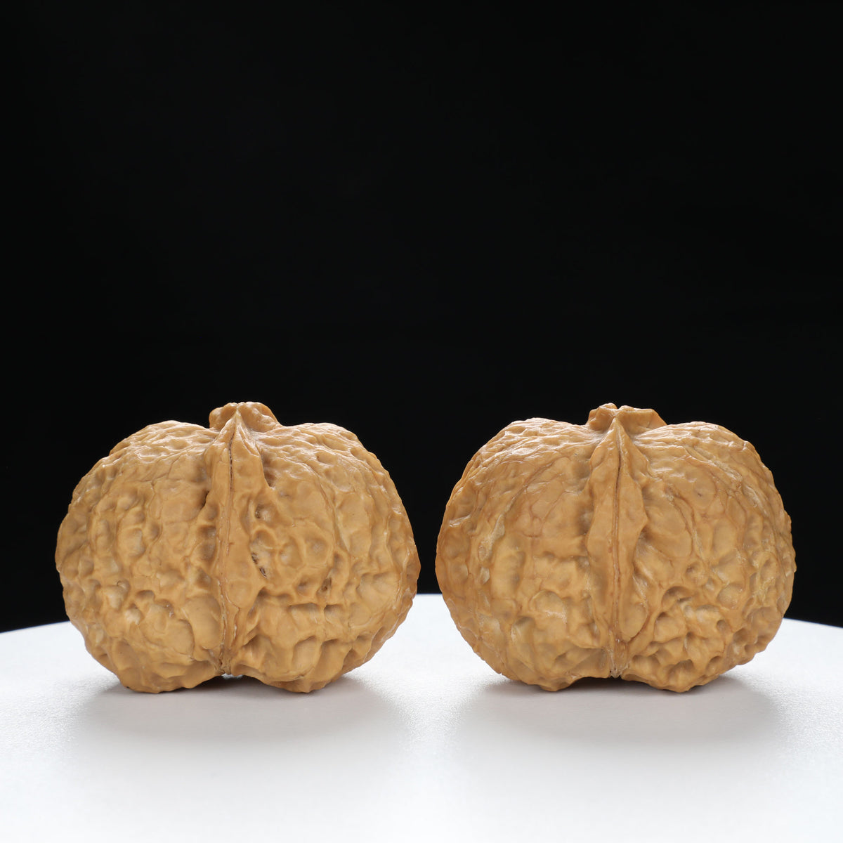 “Fortune Ingot” Big Yuanbao Gold Ingot Shape Yunnan Cloud Iron Wenwan Walnuts Pair | Size:33L*44W*35H | UPI:UR-00109