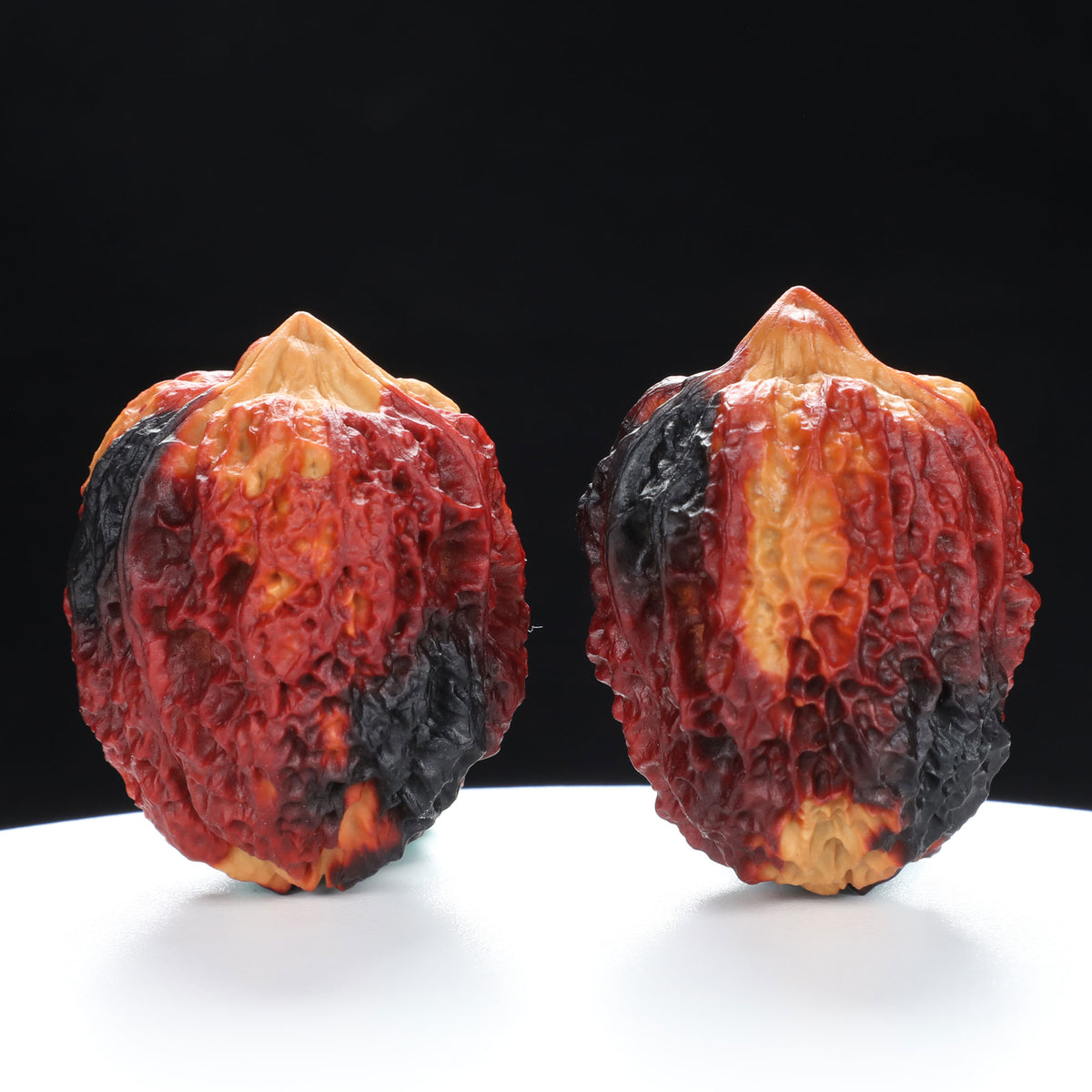 “Three-Ridged” Earth-Cured Tri-Color Coral Grain Y-Form Iron Triple-Ridge Walnuts Pair | Size:35L*35W*44H | UPI:UR-00115