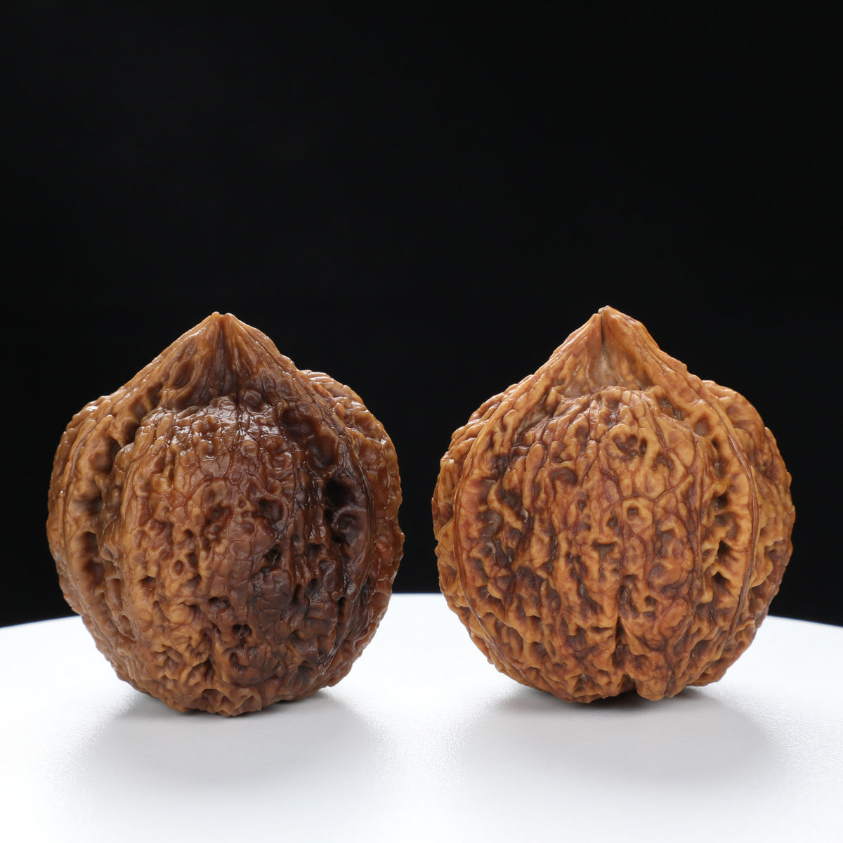 “Three-Ridged” Hand-Matched Symmetrical Three-Spoke Iron Peach Triple-Ridge Walnuts Pair | Size:39L*39W*43H | UPI:UR-00118